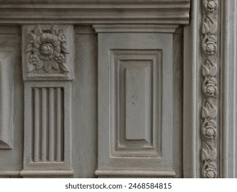 Step into the past with textured bas-relief and intricate floral designs, where baroque and rococo styles collide in a historic revival of ancient architecture, offering a striking contrast of rough  - Powered by Shutterstock