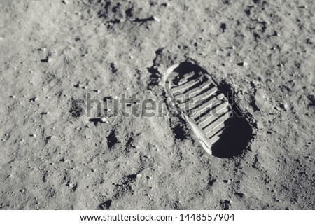 Step on the moon. Elements of this image furnished by NASA