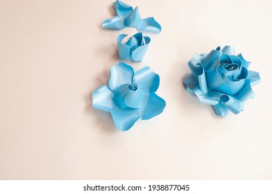 Step To Step, Paper 3 D Flower Make Origami Rose And  Handmade  Romantic Bouquet For Valentine, Wedding, Card, And Decorate Backdrop. Focus Blue Rose Paper On The White Background.