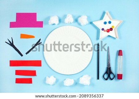 Step-by-step instruction of christmas snowman from a Paper Plate. Step 1.