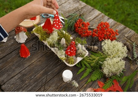 Step-by-step instructions on how to make autumn mushrooms from a cardboard egg carton.