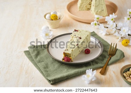 Step-by-step preparation of a cottage cheese Easter dessert in the shape of a truncated cone with pistachio paste, white chocolate and dried cranberries. The finished sliced ​​dessert is on a plate. Happy Easter.(