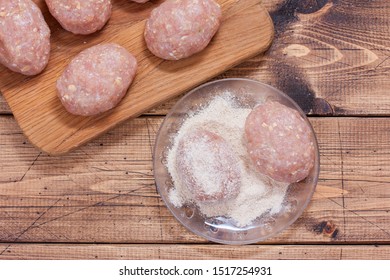 Step-by-step Preparation Of Homemade Turkey Cutlets With Cheese Filling, Step 3 - Breadcrumbs Cutlet, Top View, Selective Focus