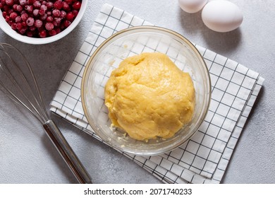 Step-by-step preparation of an open pie with red currant filling and sour cream on shortcrust pastry, step 2 - preparation of shortcrust pastry, top view, horizontal - Shutterstock ID 2071740233