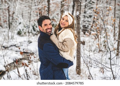 A Stepfather And Daughter On Forest In Winter Season