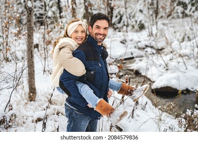 A Stepfather And Daughter On Forest In Winter Season