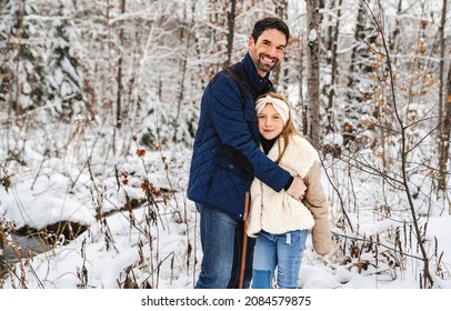 A Stepfather And Daughter On Forest In Winter Season