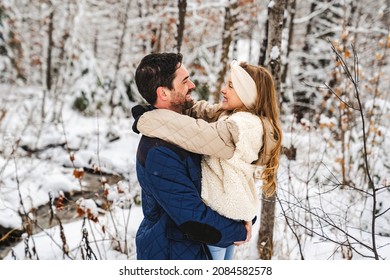 A Stepfather And Daughter On Forest In Winter Season