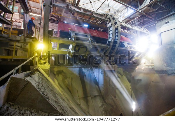 Stepnogorsk, Kazakhstan - April 04, 2012: Railway\
car dumper quick unload system. Rotary mechanism. \
Mining and\
processing plant.