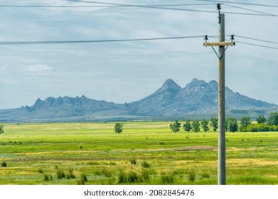 Steppe, Prairie, Veld, Veldt - Grassy Plain In The Temperate And Subtropical Zones Of The Northern And Southern Hemisphere. Plateau. Hills.