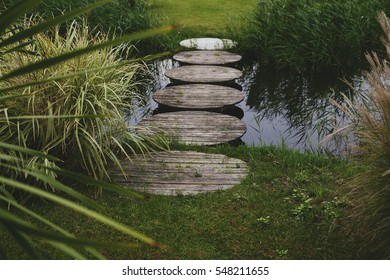 Stepping Stones Over Pond