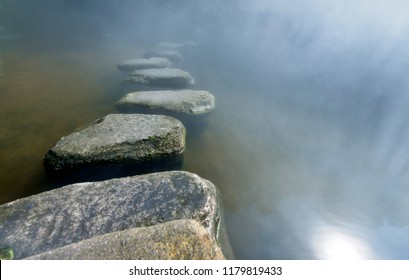 Stepping Stones Path Over A Pond