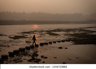 Stepping Stones In The River Water