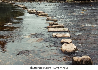 Stepping stones in the river Wharfe, Hebden, UK