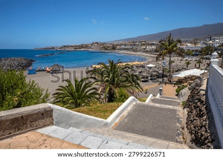Steps down to the beautiful Playa del Bobo in Costa Adeje, on the Spanish island of Tenerife.