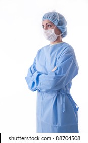 Sterile Femal Nurse Or Surgeon Wearing A Sterile Blue Suit Or Gown Waiting On The Operation Theater. Image Over White