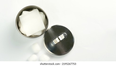 Sterile Gauze In Jar And Cotton Balls Top View