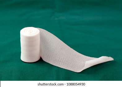 Sterile Roll Gauze On Green Operation Cloth.