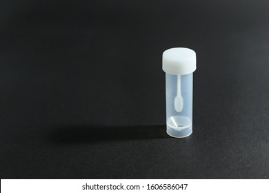 Sterile White Plastic Container Or Jar For Stool Or Feces Analysis Or Coprology Test On A Black Background