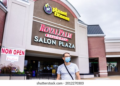 Sterling, USA - September 9, 2020: Stores At Strip Mall Plaza With People Man Person In Mask By Planet Fitness Sign And Now Open During Coronavirus In Virginia