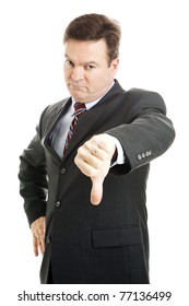 Stern, Angry Looking Businessman Or Boss Giving Thumbs Down.  Isolated On White.