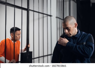 A Stern, Bald Prison Warden Makes The Rounds Of The Cells And Transmits Information Over The Radio To The Head Of The Prison Guard