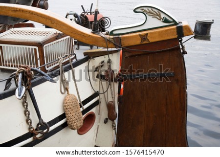 Similar – Image, Stock Photo A flat bottom ship sails by with full sails, clouds are in the sky over the sea