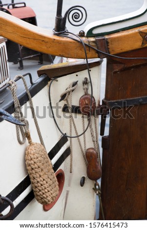 Similar – Image, Stock Photo A flat bottom ship sails by with full sails, clouds are in the sky over the sea