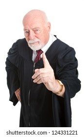 Stern old judge wags his finger as he lays down the law.  Isolated on white.