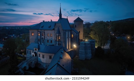 Sternberk Castle illuminated by lamps and evening lights in background. Rock - built castle Sternberk  Olomouc region, Moravia, Czech republic. - Shutterstock ID 2151594249