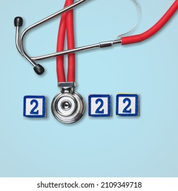 Stethoscope With 2022 Number On Background. Happy New Year For Healthcare, Insurance