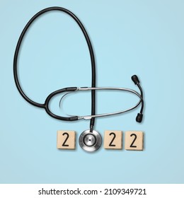 Stethoscope With 2022 Number On Background. Happy New Year For Healthcare, Insurance