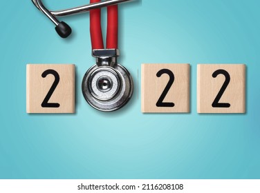 Stethoscope With 2022 Number On Background. Happy New Year For Healthcare, Insurance