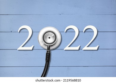 Stethoscope With 2022 Number On Background. Happy New Year For Healthcare, Insurance