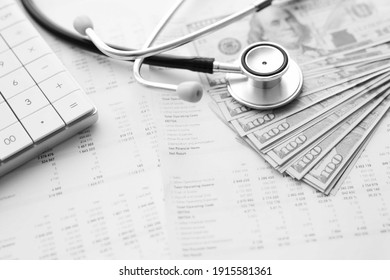 Stethoscope and calculator. Concept of health care costs or medical insurance