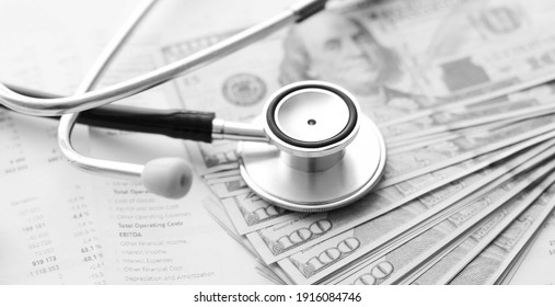 Stethoscope And Calculator. Concept Of Health Care Costs Or Medical Insurance