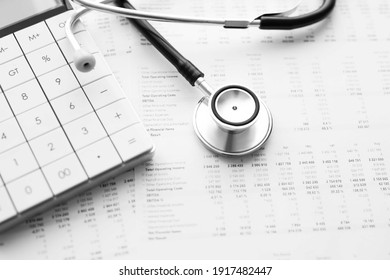 Stethoscope and calculator. Concept of health care costs or medical insurance