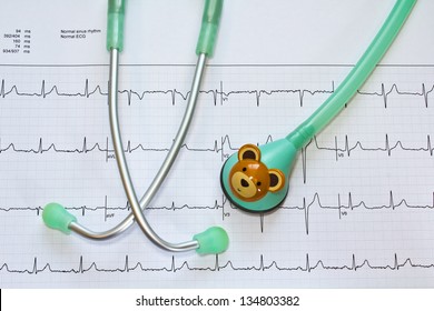 Stethoscope For Child And Electrocardiogram.