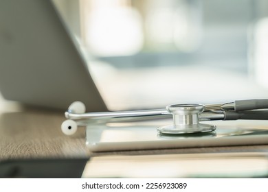 stethoscope computer and background doctor using laptop at desk medical network on Computing electronic medical - Shutterstock ID 2256923089