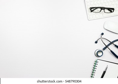 Stethoscope in doctors desk - Powered by Shutterstock