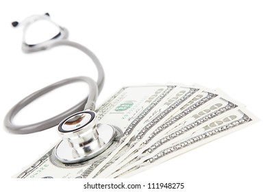 Stethoscope and dollars isolated on white illustrating expensive healthcare