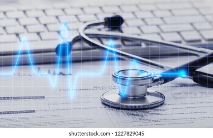 Stethoscope with financial on the desk.