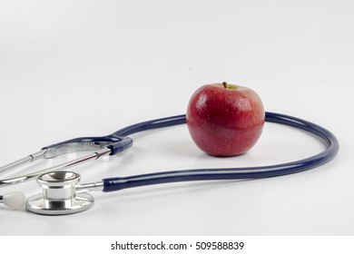 Stethoscope with fruit concept for diet, healthcare, nutrition or medical insurance