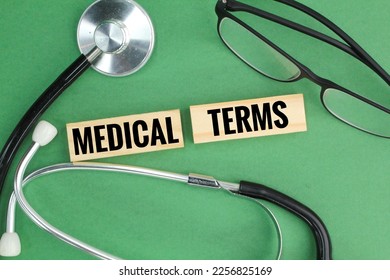 stethoscope and glasses with the words MEDICAL TERMS. medical term concepts - Shutterstock ID 2256825169