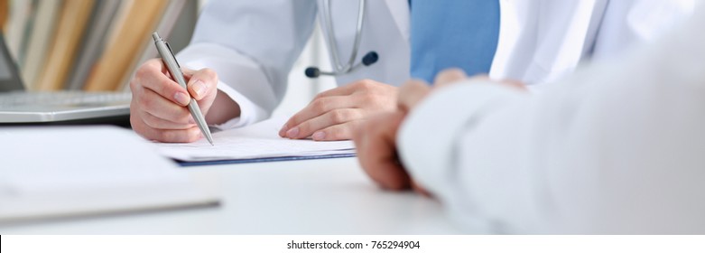 Stethoscope Head Lying On Medical Forms Closeup While Medicine Doctor Working In Background. Patient History List Visit Check 911 Medical Calculation And Statistics Healthy Lifestyle Concept