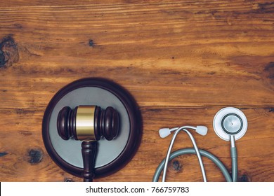 Stethoscope With Judge Gavel. Concept Of Healthcare And Medicine, Malpractice, Legal System.