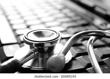 stethoscope and keyboard, as well as a place for your text - Powered by Shutterstock