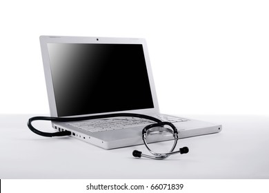 Stethoscope And Laptop Computer