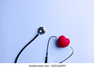 Stethoscope to listen to red heart rate to diagnosis disease. Healthcare concept.