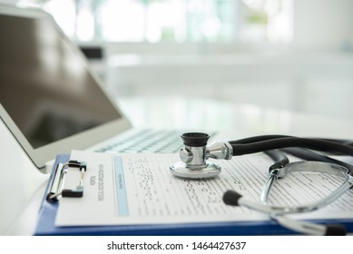 stethoscope and medical document  on doctor desk at hospital room. healthcare and medicine concept. - Shutterstock ID 1464427637